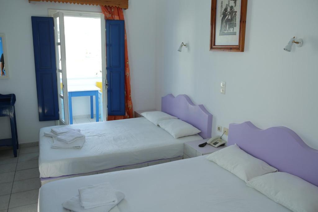 Studios Apartments Perivolos الغرفة الصورة
